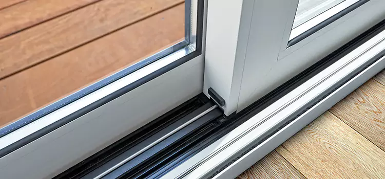 Why Your Sliding Door Keeps Getting Stuck in Needham, MA?